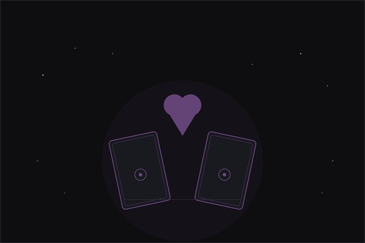 Love tarot spread: two tarot cards and a plum heart beneath a crescent moon on a dark flat lay