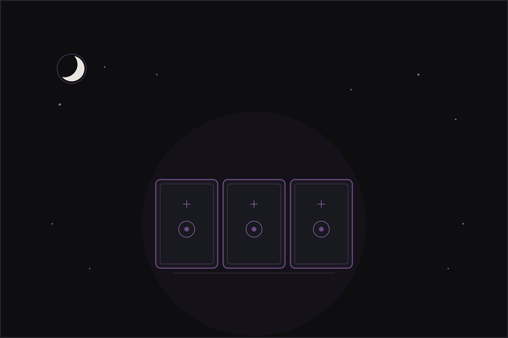 Tarot spreads for self discovery: three tarot cards laid in a row beneath a crescent moon